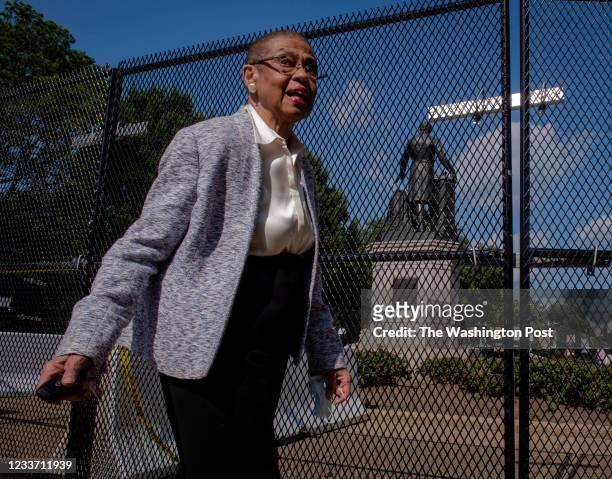 July 02: Del. Eleanor Holmes Norton, walks through Lincoln park, past the controversial Emancipation statue in her neighborhood in Washington, DC on...