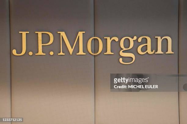 The logo of JP Morgan bank is pictured at the new French headquarters of the bank on June 29, 2021 in Paris. - American bank JP Morgan's new trading...