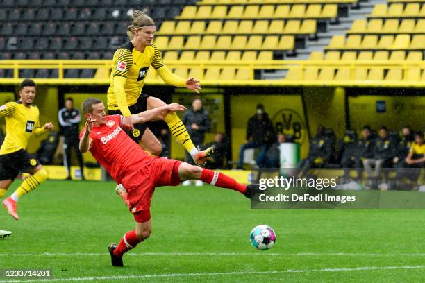 Sven Bender of Bayer 04 Leverkusen and Erling Haaland of Borussia Dortmund battle for the ball during the Bundesliga match between Borussia Dortmund...