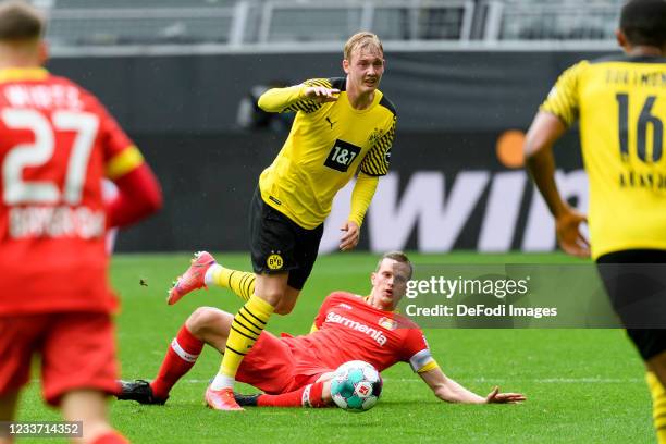 Julian Brandt of Borussia Dortmund and Sven Bender of Bayer 04 Leverkusen battle for the ball during the Bundesliga match between Borussia Dortmund...