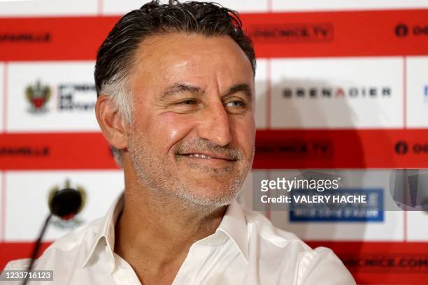 French football coach Christophe Galtier smiles during his official presentation to the press as French L1 football club OGC Nice's new head coach in...