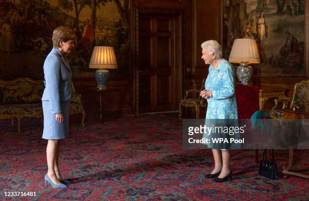 Queen Elizabeth II receives First Minister of Scotland Nicola Sturgeon during an audience at the Palace of Holyroodhouse on June 29, 2021 in...