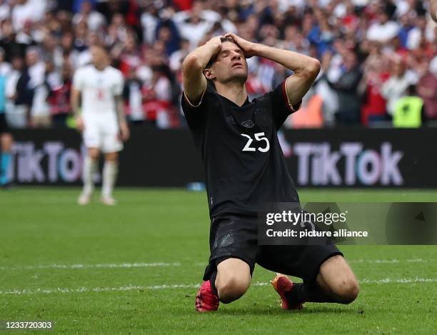 June 2021, United Kingdom, London: Football: European Championship, England - Germany, Final Round, Round of 16 at Wembley Stadium. Germany's Thomas...