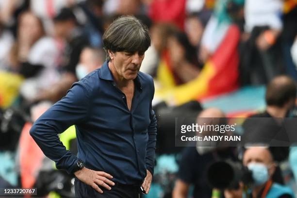 Germany's coach Joachim Loew reacts during the UEFA EURO 2020 round of 16 football match between England and Germany at Wembley Stadium in London on...