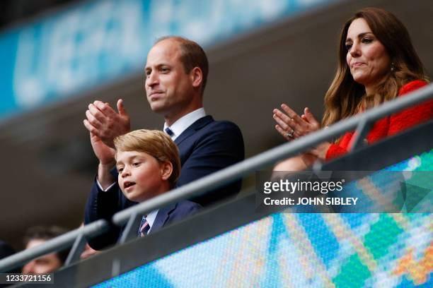 Prince William, Duke of Cambridge, Prince George of Cambridge, and Catherine, Duchess of Cambridge, celebrate the win in the UEFA EURO 2020 round of...