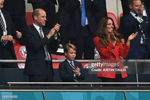 Prince William, Duke of Cambridge, Prince George of Cambridge, and Catherine, Duchess of Cambridge, celebrate the first goal in the UEFA EURO 2020...