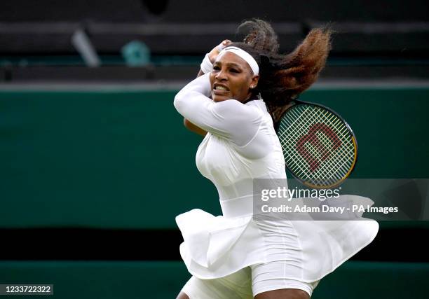 Serena Williams in action during her first round ladies' singles match against Aliaksandra Sasnovich on centre court on day two of Wimbledon at The...