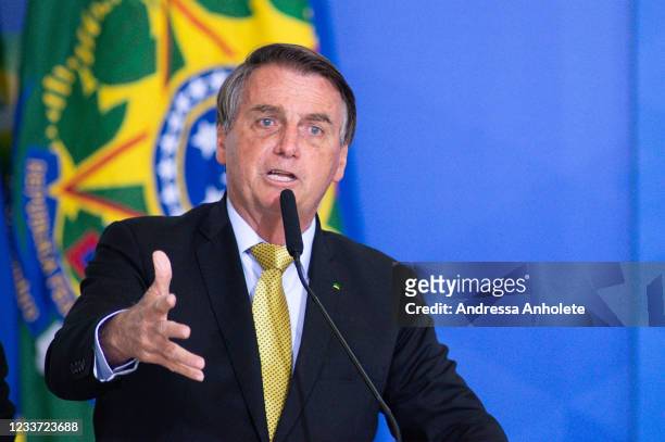 President of Brazil Jair Bolsonaro speaks during an event to launch a new register for professional workers of the fish industry at Planalto...
