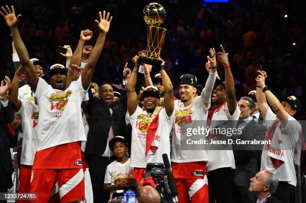 Kyle Lowry of the Toronto Raptors celebrates with the Larry O'Brien Trophy after winning Game Six of the NBA Finals on June 13, 2019 at ORACLE Arena...