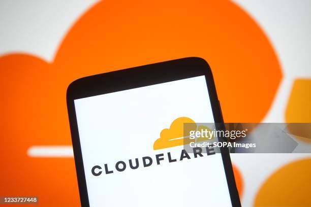 In this photo illustration, Cloudflare logo of an US internet company is seen on a smartphone screen.