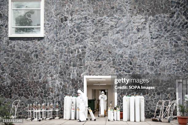 Health worker wearing Personal Protective Equipment seen inside the Wisma Atlet Covid-19 Emergency Hospital complex. Indonesia has seen a significant...