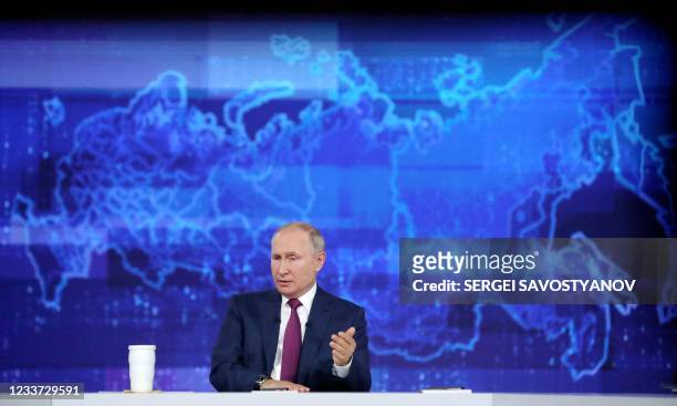 Russian President Vladimir Putin attends an annual televised phone-in with the country's citizens "Direct Line with Vladimir Putin" at the Moscow's...