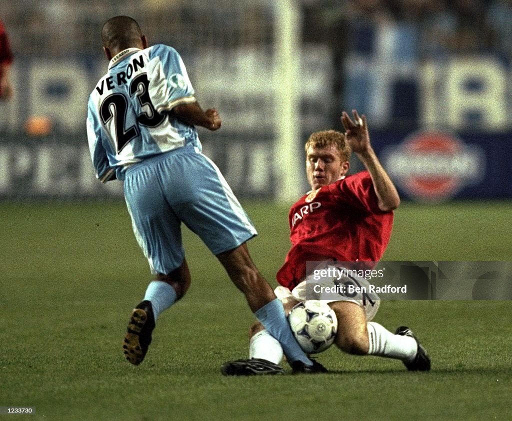 Paul Scholes of Manchester United Juan Veron of Lazio