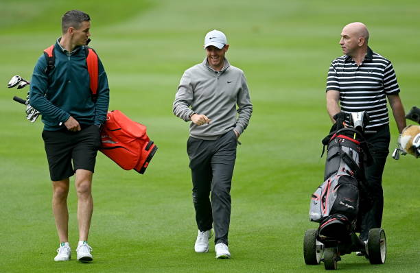 Kilkenny , Ireland - 30 June 2021; Rory McIlroy of Northern Ireland with Leinster and Ireland rugby captain Jonathan Sexton, left, and former...