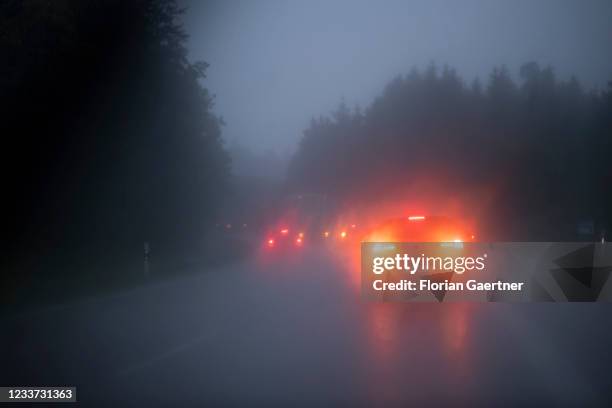 Cars on the highway A99 are pictured during heavy rain near Munich on June 29, 2021 in Munich, Germany.