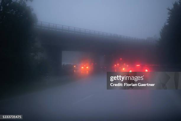 Cars on the highway A99 are pictured during heavy rain near Munich on June 29, 2021 in Munich, Germany.