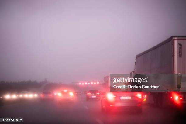 Cars on the highway A99 are pictured during heavy rain near Munich on June 29, 2021 in Munich, Germany.