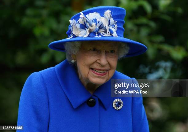 Queen Elizabeth II visits the Children's Wood Project, a community project in Glasgow as part of her traditional trip to Scotland for Holyrood Week...