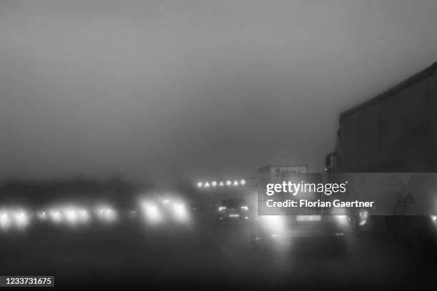 Cars on the highway A99 are pictured during heavy rain near Munich on June 29, 2021 in Munich, Germany.