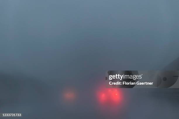 Cars on the highway A99 are pictured during heavy rain near Munich on June 29, 2021 in Munich, Germany.