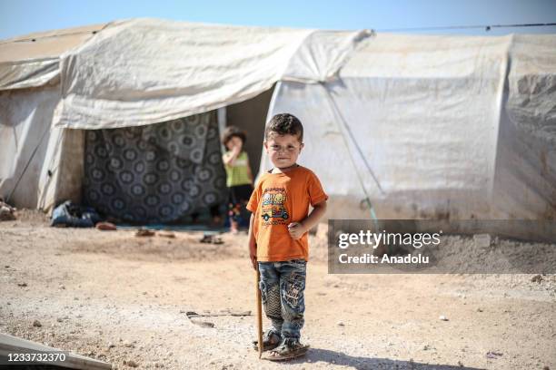 Syrians taking refuge in a camp await for help as they also hope Bab Al-Hawa border gate to remain open in order to receive any humanitarian aid in...