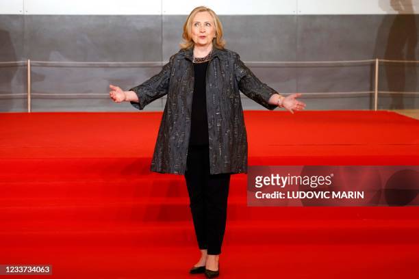 Former US Secretary of State Hillary Clinton arrives to the opening session of the Generation Equality Forum, a global gathering for gender equality...
