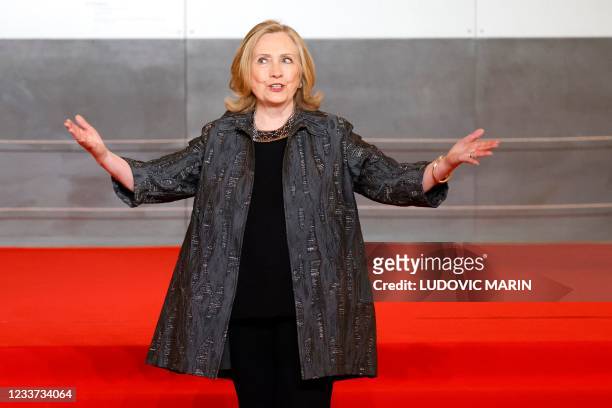 Former US Secretary of State Hillary Clinton arrives to the opening session of the Generation Equality Forum, a global gathering for gender equality...