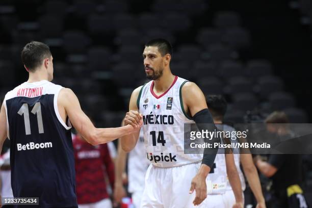 Semen Antonov of Russia congratulations on the victory Gustavo Ayón of Mexico during the 2020 FIBA Men's Olympic Qualifying Tournament game between...