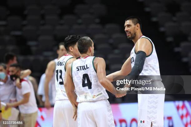 Gustavo Ayón of Mexico celebrates victory with teammates after during the 2020 FIBA Men's Olympic Qualifying Tournament game between Mexico and...