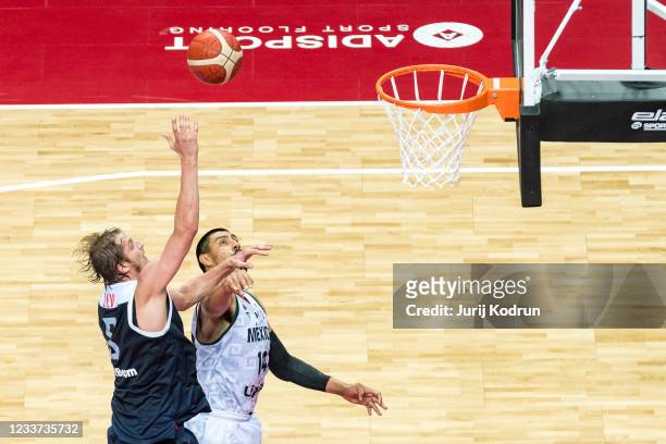 Gustavo Ayon of Mexico and Vladimir Ivlev of Russia during the 2020 FIBA Men's Olympic Qualifying Tournament game between Mexico and Russia at...