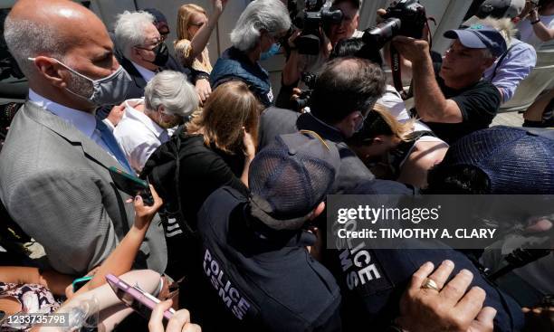 German-born American TV actress Allison Mack leaves Brooklyn Federal Court on June 30, 2021 in New York, after being sentenced for three years, for...