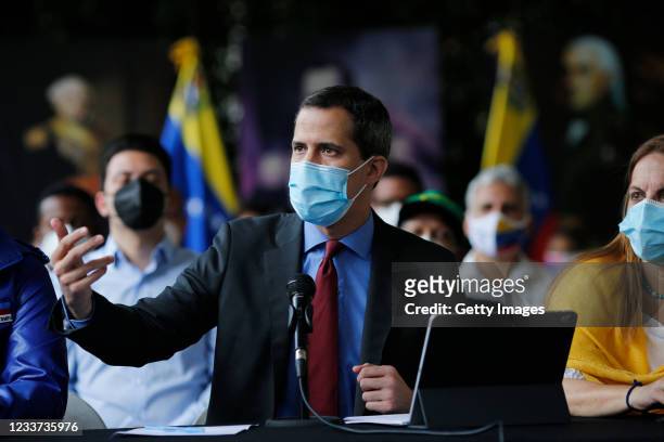 Opposition leader Juan Guaido speaks during a press confrence at the Morichal park in Prados del Este neighborhood on June 30, 2021 in Caracas,...