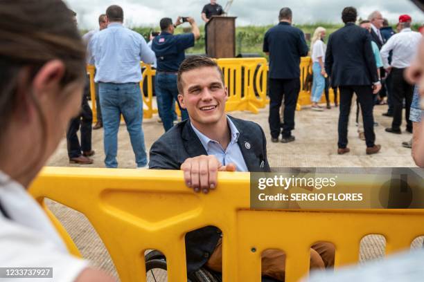 Rep. Madison Cawthorn speaks to reporters during a visit to the border wall near Pharr, Texas on June 30, 2021. - Former President Donald Trump...