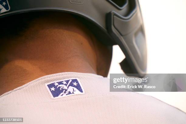 Minor League Baseball: Closeup view of minor league baseball logo on jersey of Hudson Valley Renegades player during game vs Brooklyn Cyclones at...