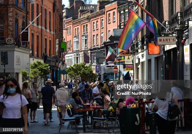 People enjoy food and drink in Dublin city center. On Wednesday, 30 June 2021, in Dublin, Ireland.