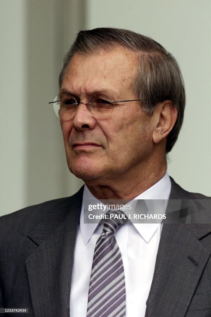President Rumsfeld US Secretary of Defense Donald Rumsfeld listens as US President... News ...
