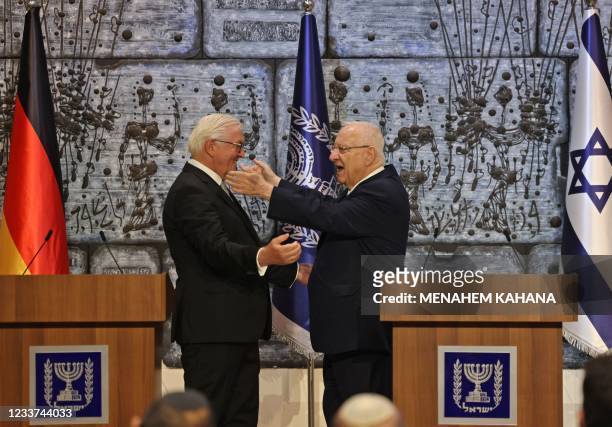Israeli President Reuven Rivlin and his German counterpart Frank-Walter Steinmeier are pictured during a joint press briefing in Jerusalem on July 1,...