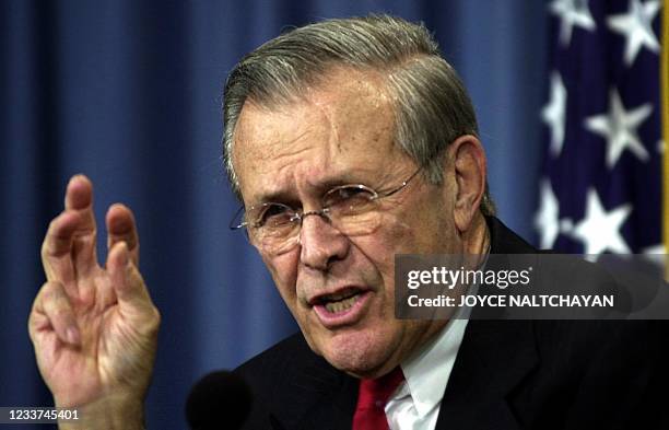 Secretary of Defense Donald Rumsfeld speaks to reporters a during a press conference 16 December 2003 at the Pentagon in Washington, DC. Rumsfeld...