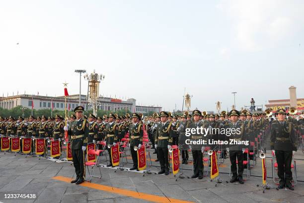 Members of the Chinese military orchestra march on Tiananmen Square before a celebration marking the 100th founding anniversary of the Chinese...
