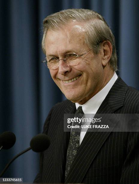 Secretary of Defense Donald Rumsfeld briefs reporters on the war in Iraq and Saddam Hussein 09 April 2003 at the Pentagon in Washington, DC. The...