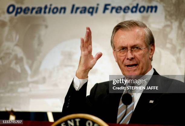 Secretary of Defense Donald Rumsfeld briefs the media at the Pentagon 21 March 2003 in Washington, DC. Rumsfeld advised that the main air war had...