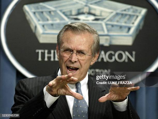 Secretary of Defense Donald Rumsfeld gestures while speaking to reporters 01 April 2003 at the Pentagon in Washington, DC. Rumsfeld said it was not...