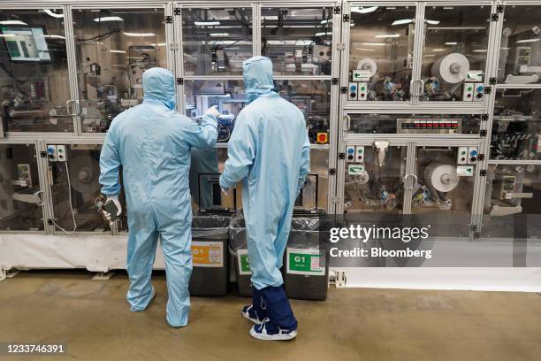 Employees monitor production at the Envision AESC Holding Ltd. Battery manufacturing facility inside the Nissan Motor Co. Plant in Sunderland, U.K.,...