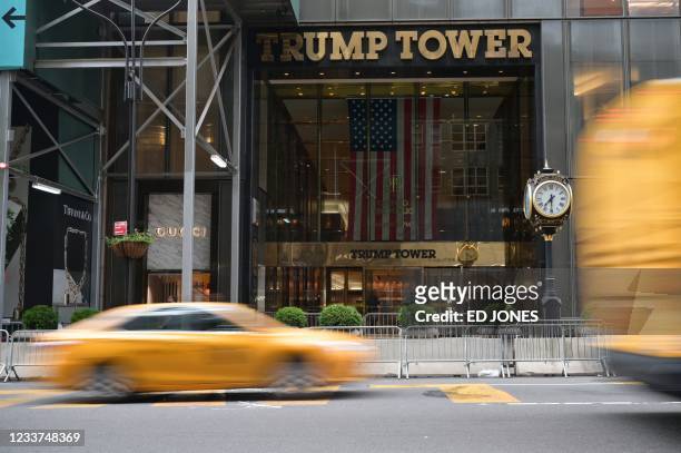Traffic drives past the Trump Tower building in Manhattan, on July 1, 2021 in New York. - Former president Donald Trump's company and its...