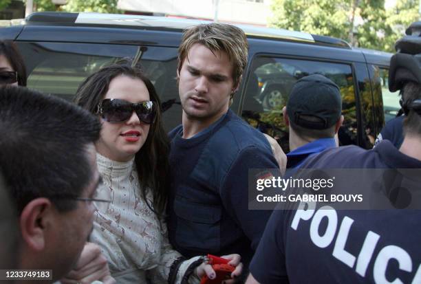 Pop star Britney Spears arrives at the Los Angeles County Superior courthouse 14 January 2008 for a hearing regarding visitation rights for her two...