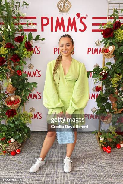 Ella Eyre enjoys PIMM'S No 1 hospitality at The Championships, Wimbledon on July 1, 2021 in London, England.