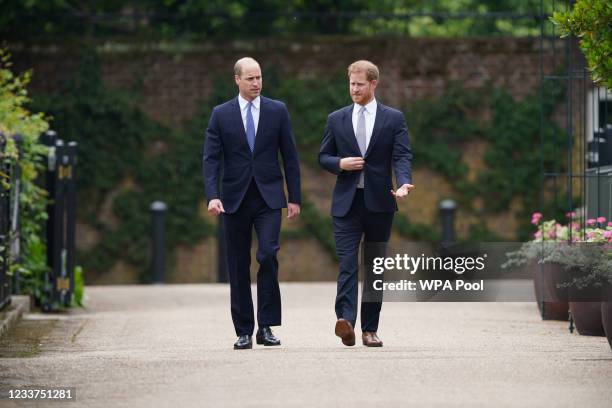 Prince William, Duke of Cambridge and Prince Harry, Duke of Sussex arrive for the unveiling of a statue they commissioned of their mother Diana,...