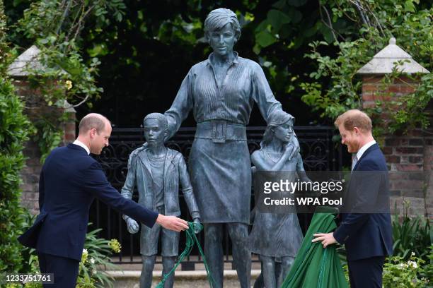 Prince William, Duke of Cambridge and Prince Harry, Duke of Sussex unveil a statue they commissioned of their mother Diana, Princess of Wales, in the...