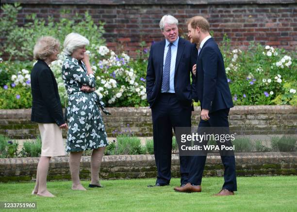 Lady Sarah McCorquodale, Lady Jane Fellowes and Earl Spencer, with their nephew Prince Harry, Duke of Sussex during the unveiling of a statue of...
