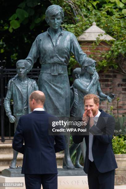 Prince William, Duke of Cambridge and Prince Harry, Duke of Sussex unveil a statue they commissioned of their mother Diana, Princess of Wales, in the...